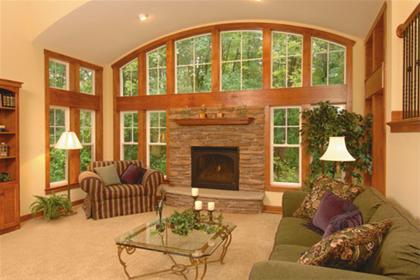 Living room with prominently displayed Windsor windows.