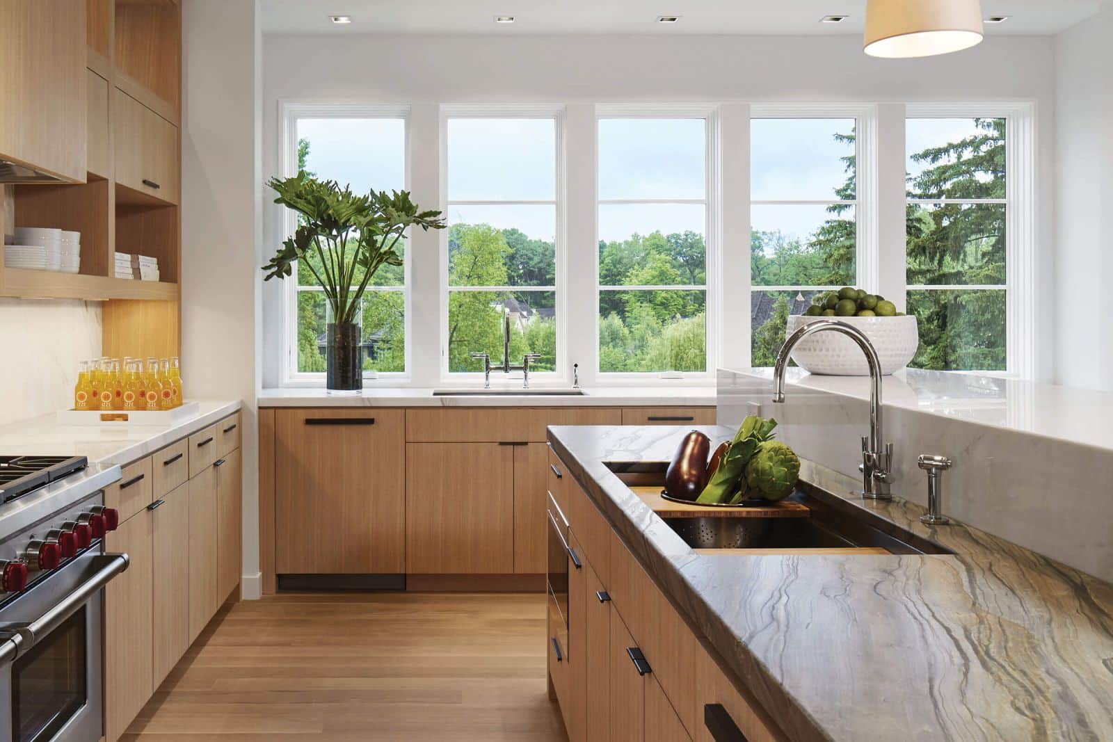 A kitchen full of windows showing off elevate casement windows.