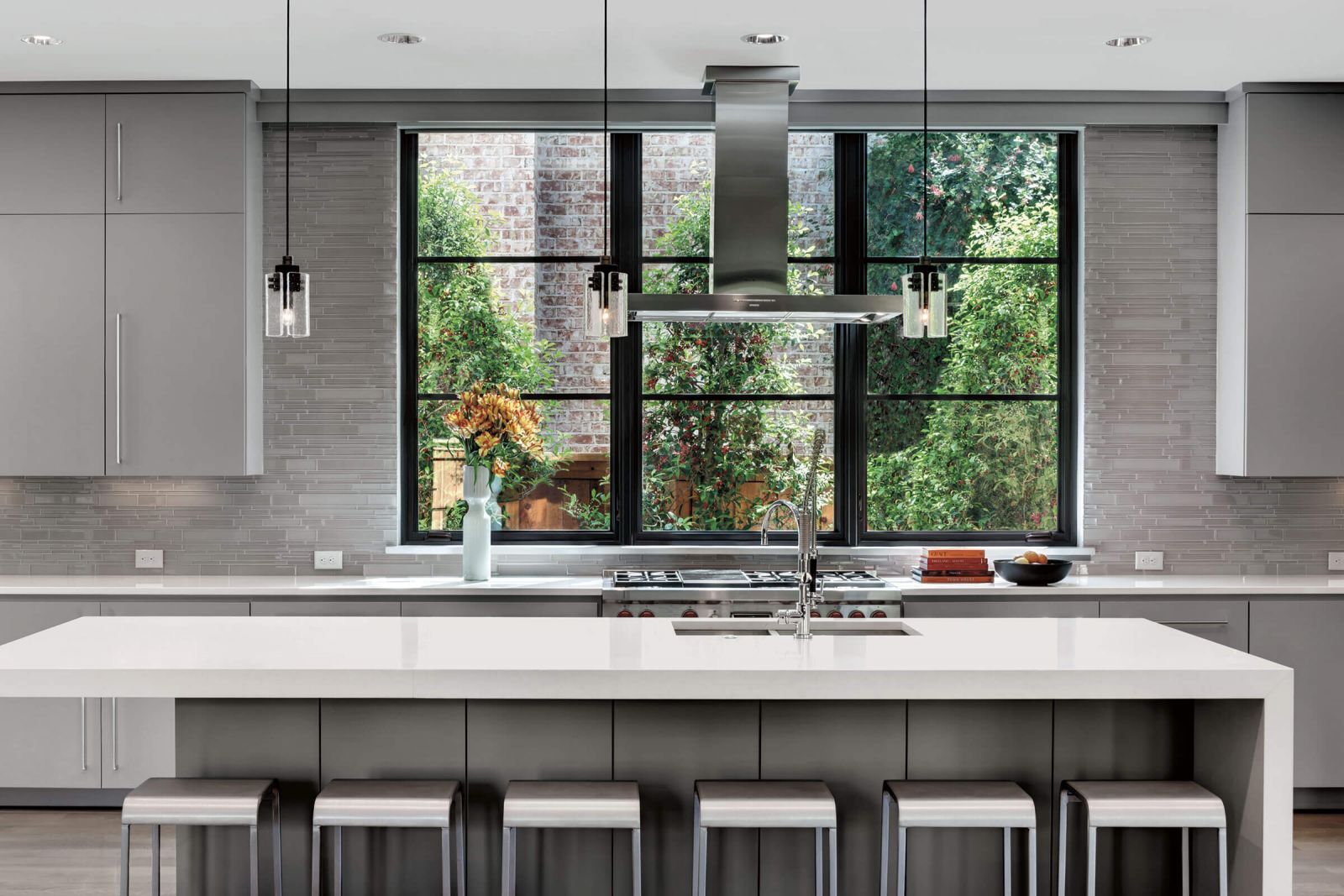 A modern kitchen featuring ultimate casement frames.