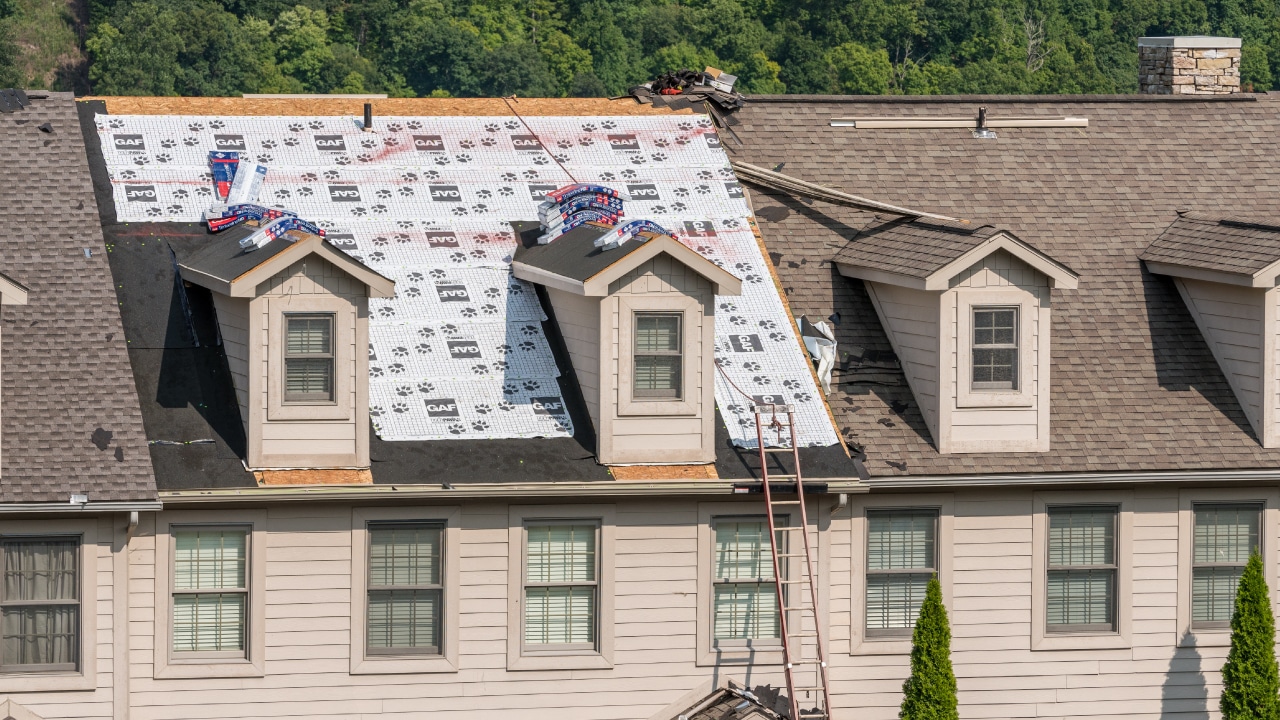 The damaged roof of a home in Minnesota restored by the roofing contractors at MNRC.